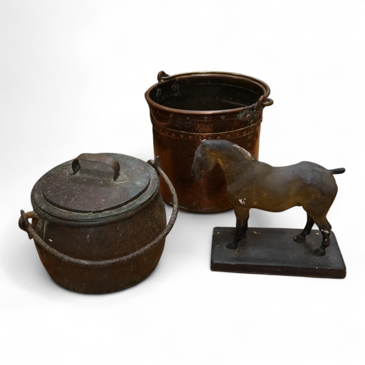 Two copper vessels and a plaster model of a horse